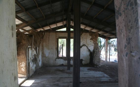 Interior of 1860s Trujillo Adobe with outer shell structure protecting remaining adobe walls. 