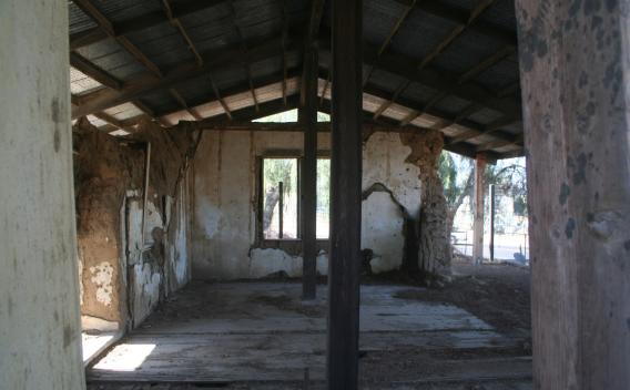 Interior of 1860s Trujillo Adobe with outer shell structure protecting remaining adobe walls. 
